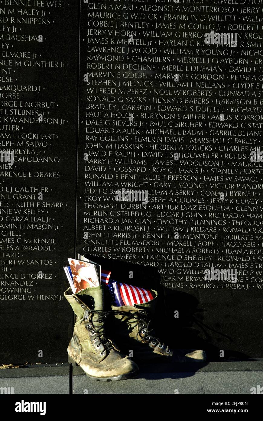 Shoes in front of Vietnam War memorial plaque, Memorial, DC, Vietnam ...