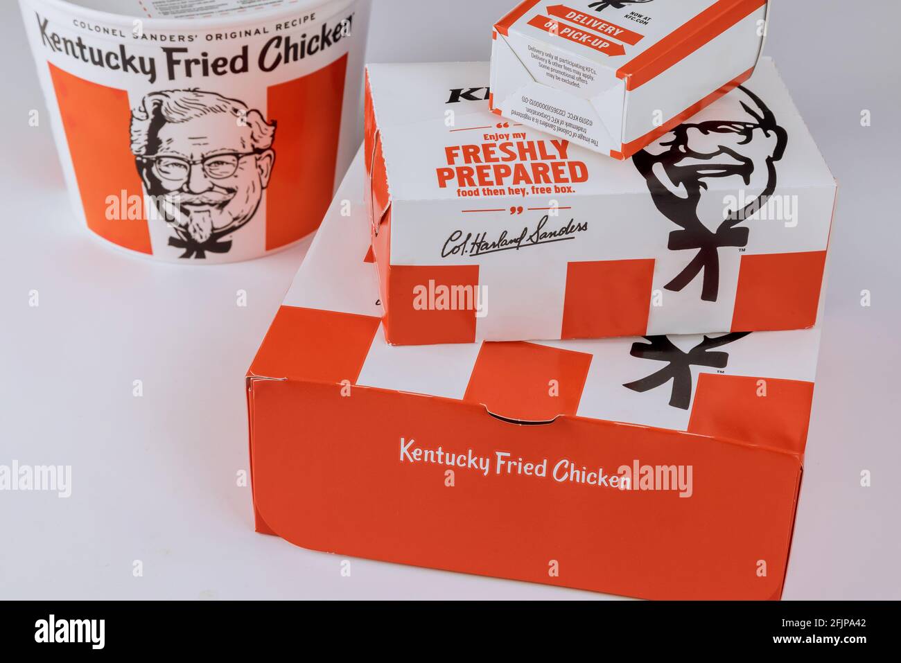 KFC famous fast food restaurant chain is a Kentucky Fried Chicken on set food box Stock Photo