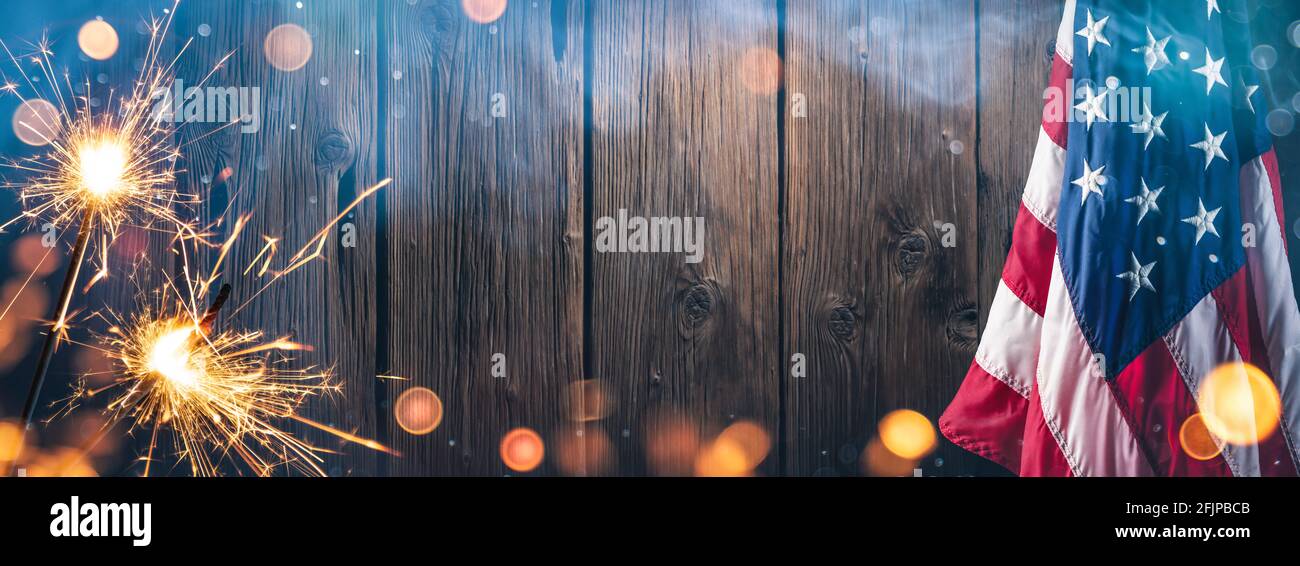 4th Of July - American Flag With Sparklers And Smoke On Rustic Wooden ...