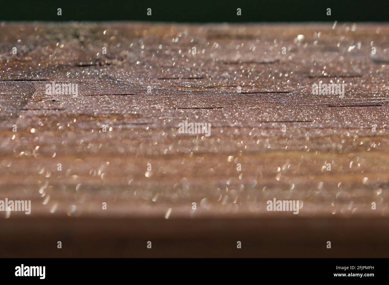 weathered plank deck railing outdoors covered in morning dew Stock ...