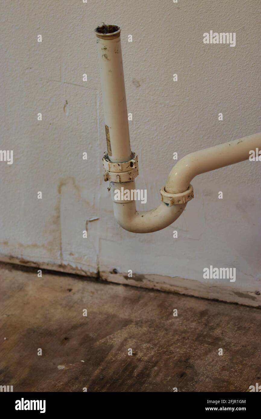disconnected old white pvc pipe for kitchen sink Stock Photo Alamy