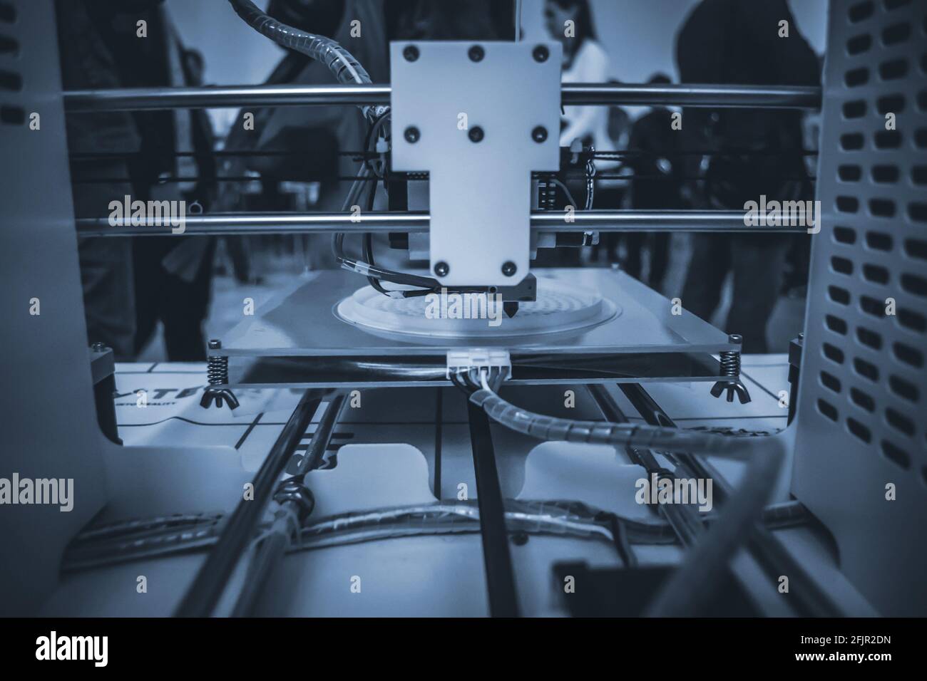 The process of working 3D printer and creating a three-dimensional object Stock Photo