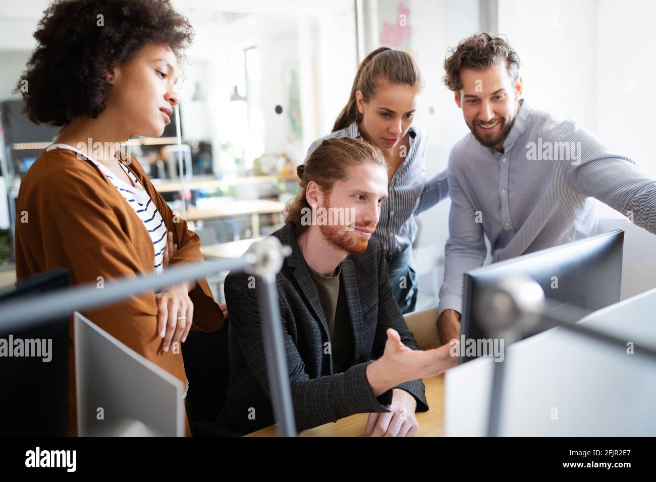 Programmer working in a software developing company Stock Photo - Alamy