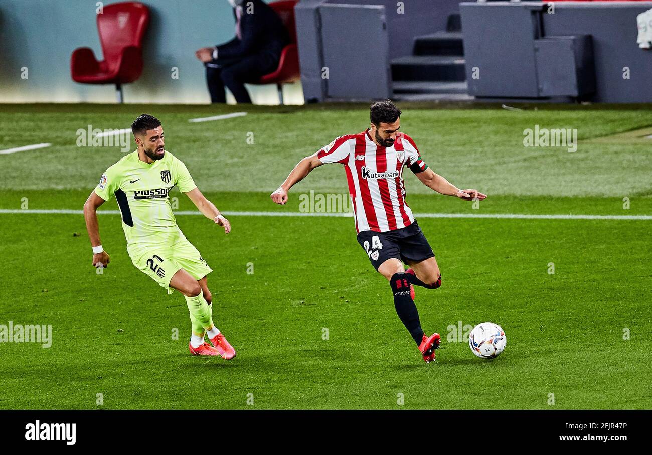 Yannick Carrasco of Atletico de Madrid and Mikel Balenciaga of Athletic  Club during the Spanish championship La Liga football match between  Athletic Club and Atletico de Madrid on April 25, 2021 at