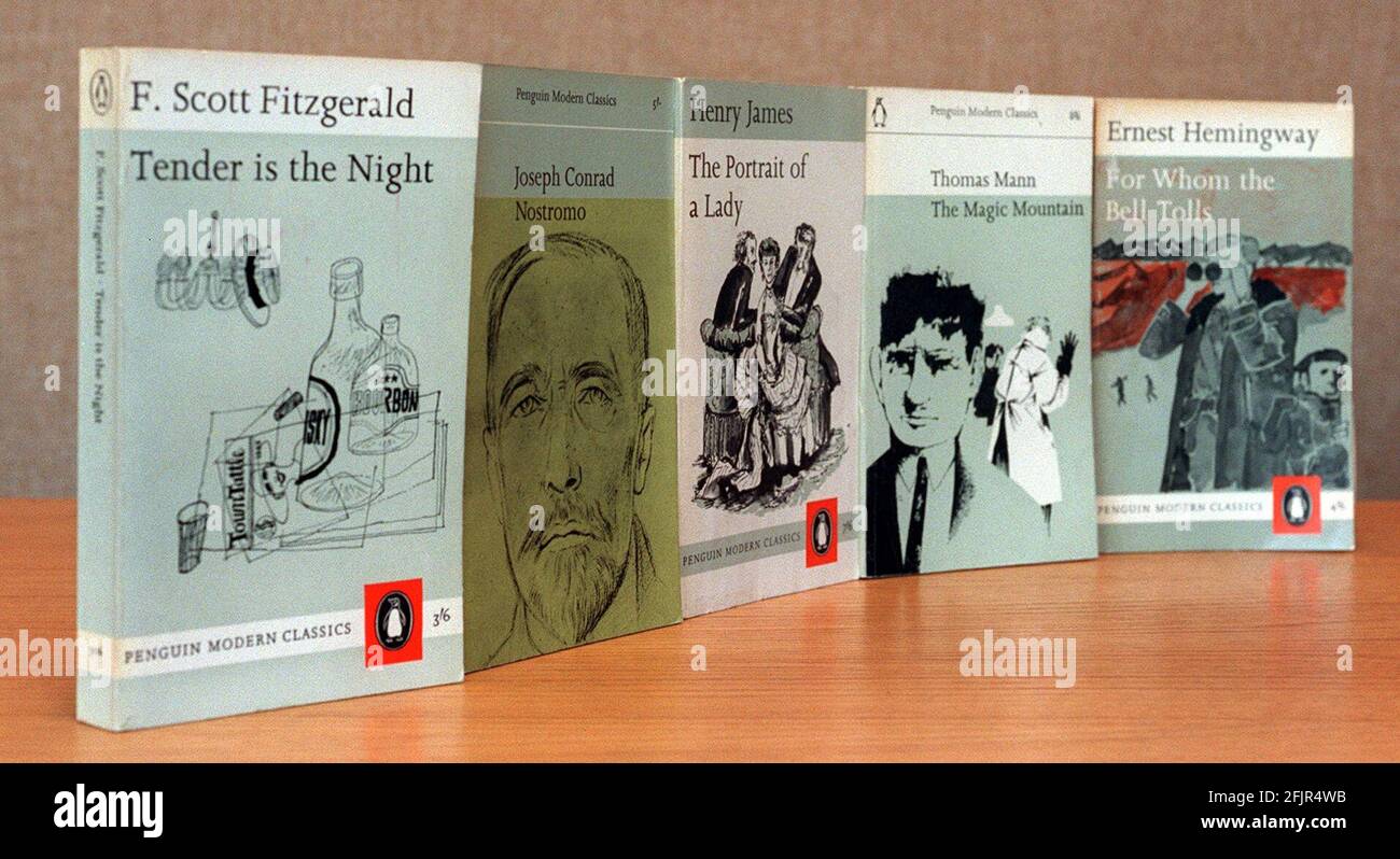 Penguin Modern Classics Paperback Books January 2000Tender is the Night by F Scott Fitzgerald Nostromo by Joesph Conrad The Portrait of a Lady by Henry James  The Magic Mountain by Thomas Mann and For Whom the Bell Tolls by Ernest Hemingway Stock Photo