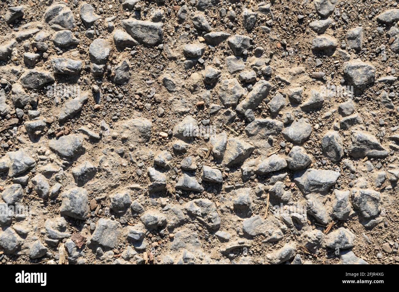 Pavement gravel, grey stone ground and hard surface flat lay view from directly above, abstract background or wallpaper Stock Photo
