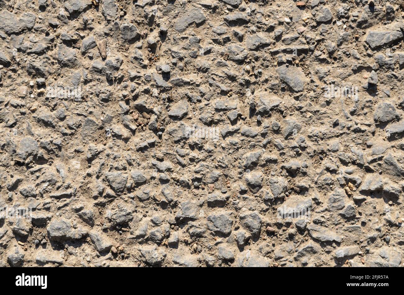Pavement gravel, grey stone ground and hard surface flat lay view from directly above, abstract background or wallpaper Stock Photo