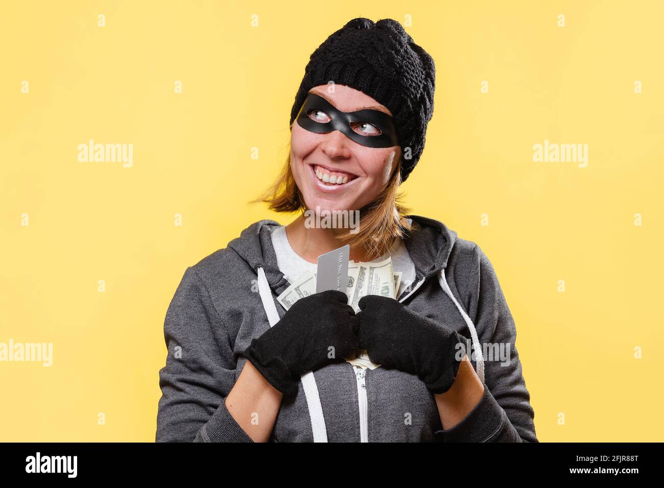 Female hacker in black mask hires stock photography and images Alamy