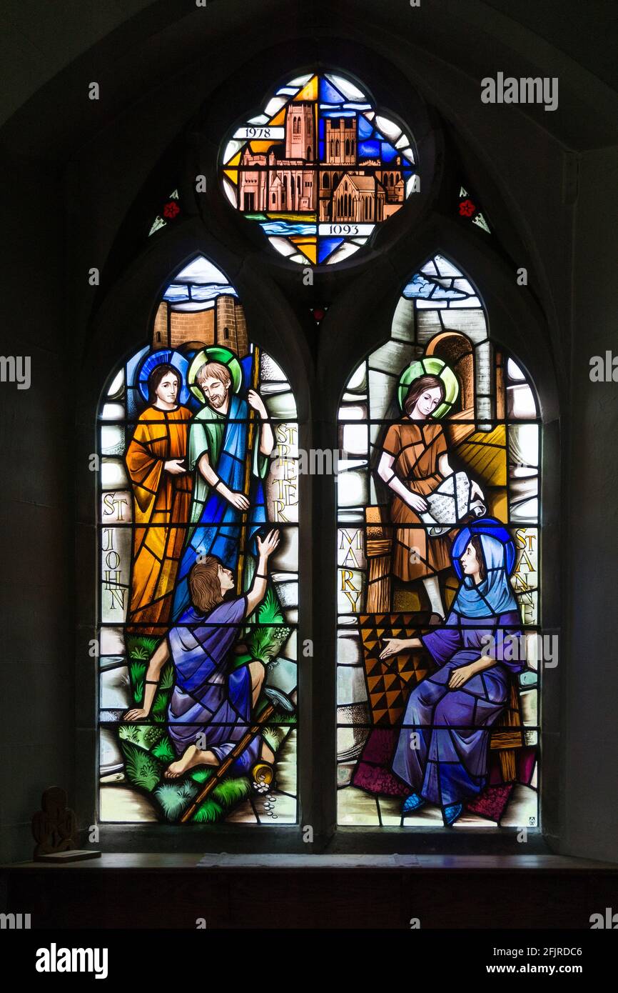 Modern stained glass window in the parish church of All Saints, Thornton Hough, Wirral, UK; by Alfred Robin Fisher, Chapel Studio, 1981 Stock Photo