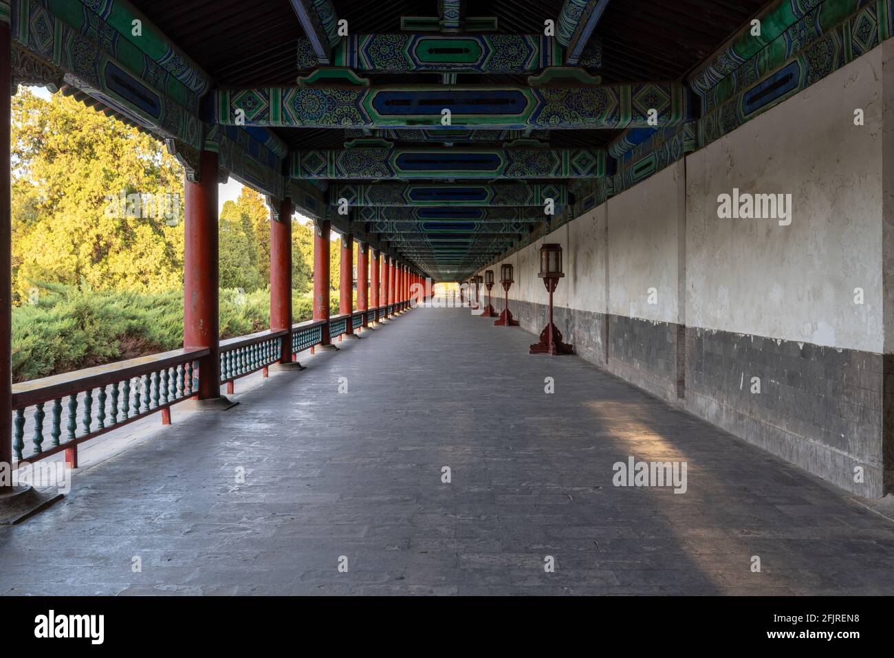 Ancient buildings with red wall and corridor in the Park of Temple of ...