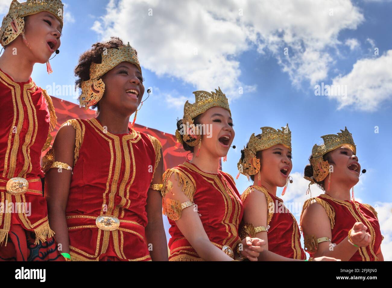 Female dancers and singers in traditional Indonesian costume perform at Hello Indonesia Festival, London Stock Photo