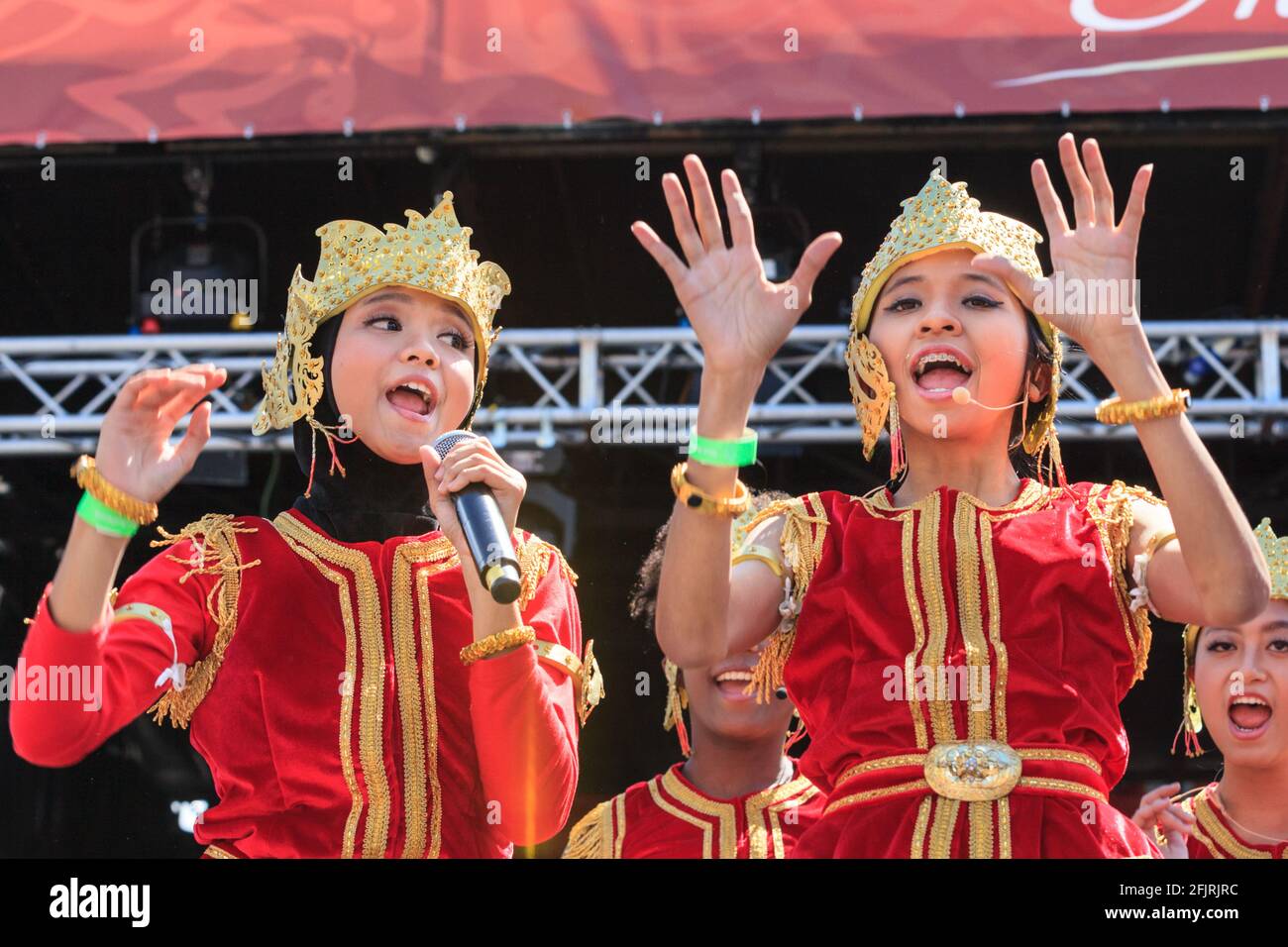 Female dancers and singers in traditional Indonesian costume perform at Hello Indonesia Festival, London Stock Photo