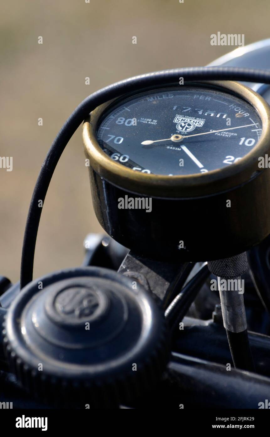 vintage motorcycle speedometer and front suspension adjustment screw