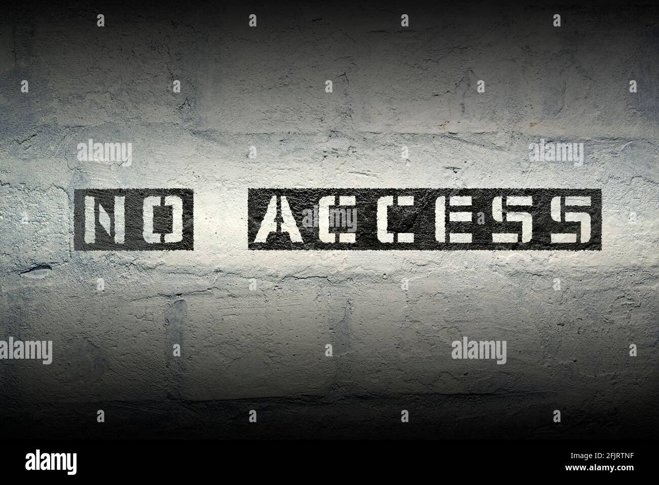 no access exclamation stencil print on the grunge white brick wall Stock Photo
