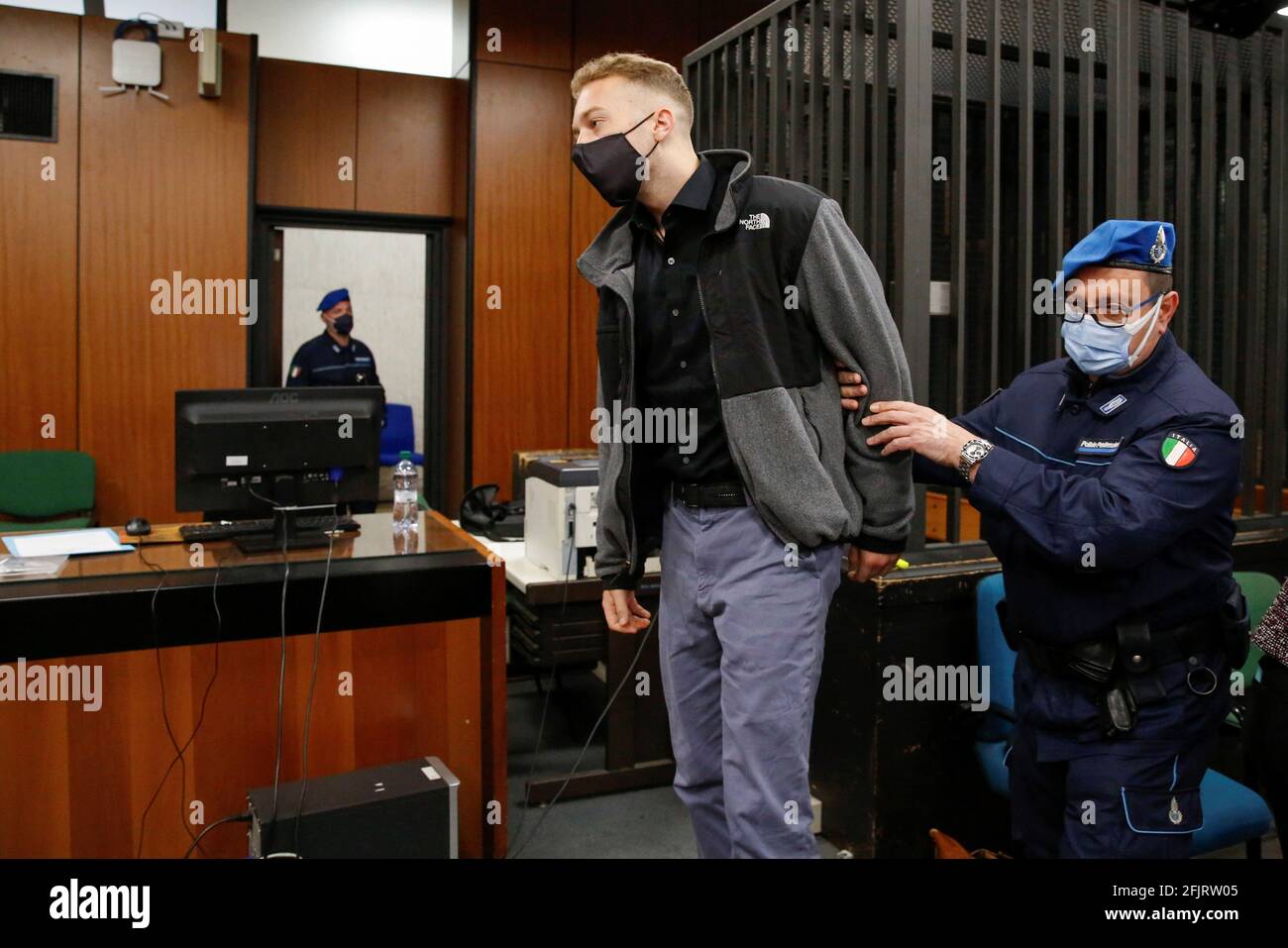 . citizen Finnegan Lee Elder, who is being tried on murder charges after  Italian Carabinieri paramilitary police officer Mario Cerciello Rega was  killed in July 2019, leaves the courtroom during a break