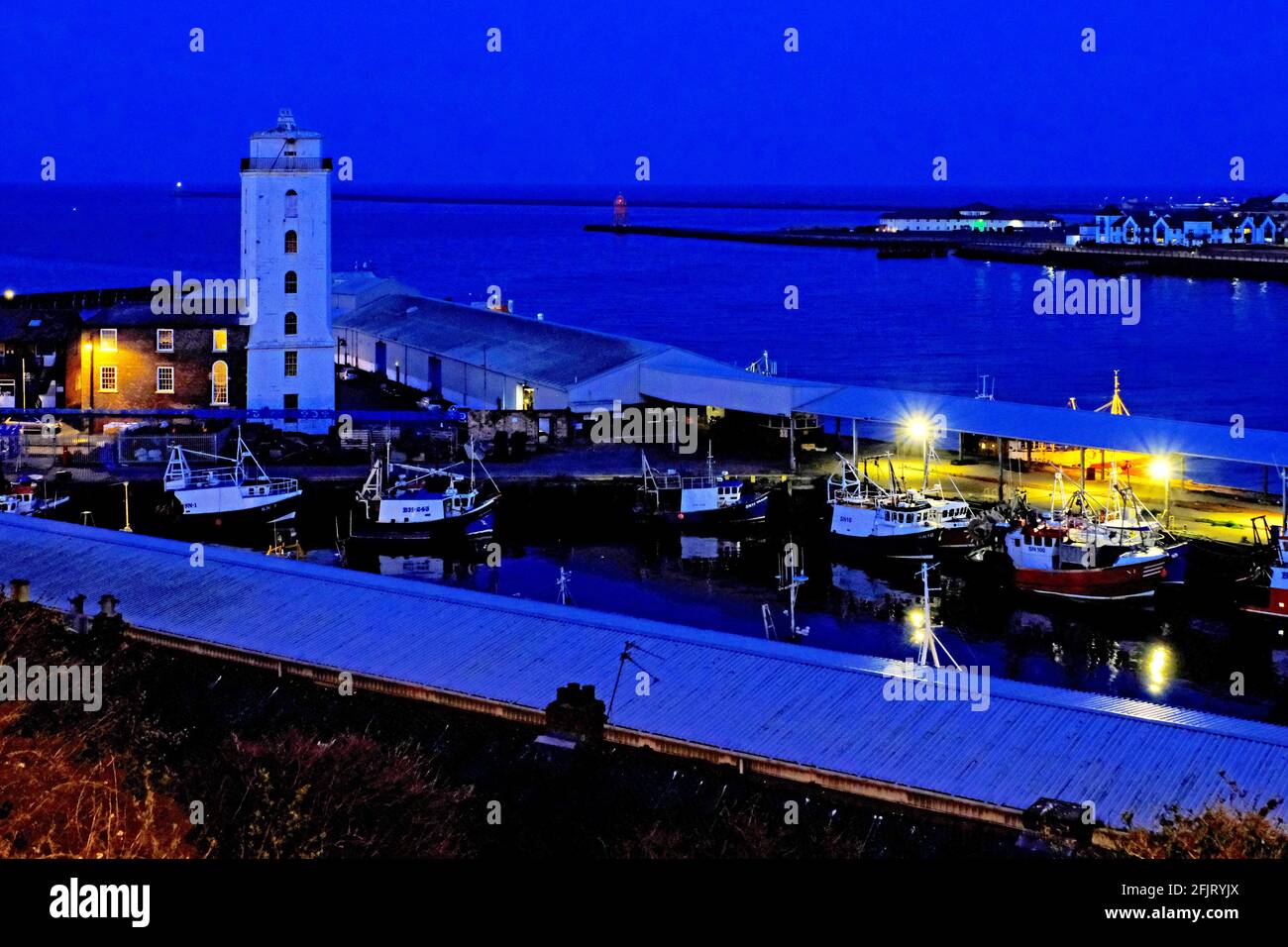 North Shields fishing fleet in port at night awaiting good weather