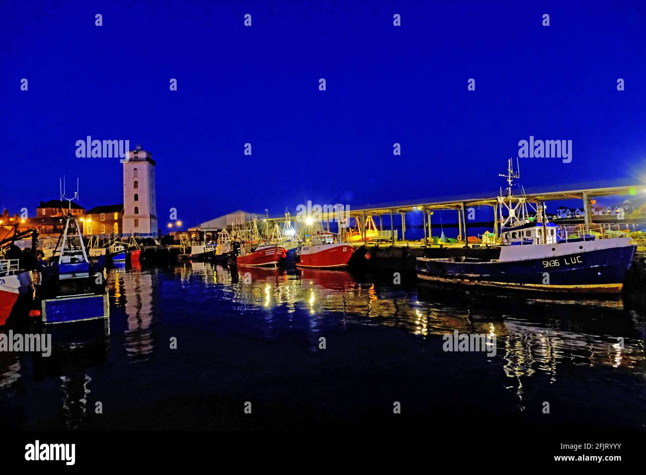 North Shields fishing fleet in port at night awaiting good weather