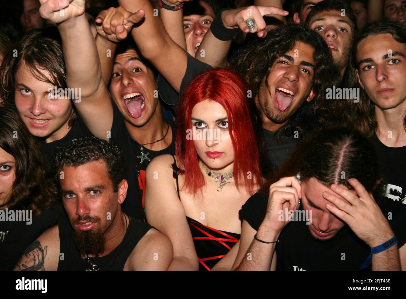 https://c8.alamy.com/comp/2FJT48E/crowd-and-audience-at-a-heavy-metal-rock-performance-photographed-in-israel-2FJT48E.jpg