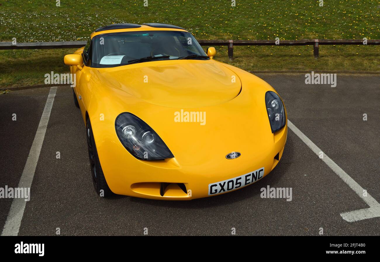 Classic Yellow TVR Motor Car in parking space. Stock Photo