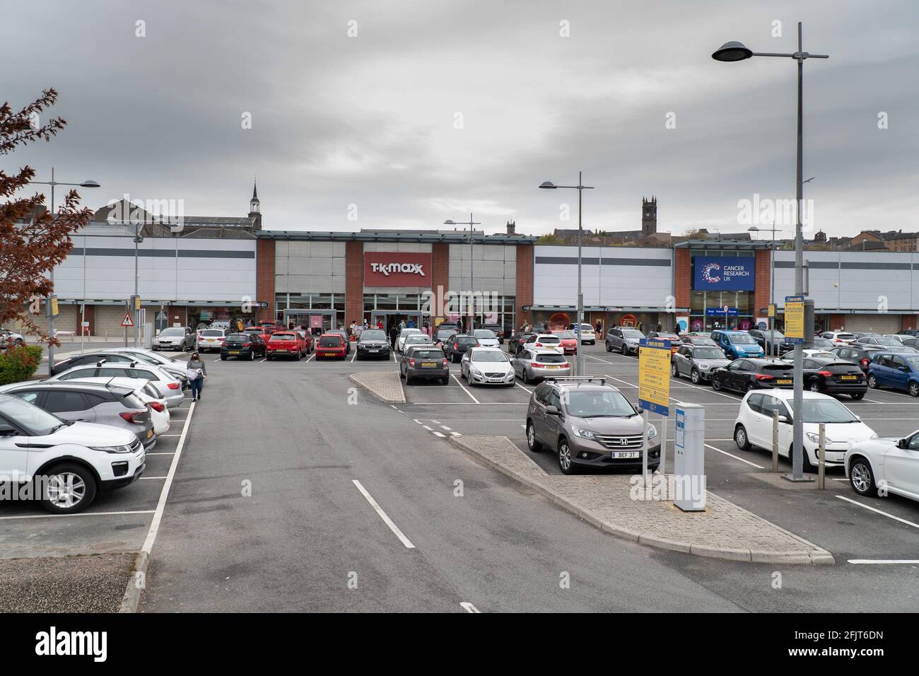 Dundee, Tayside, Scotland, 26.04.21: Large queues wait to enter TK Maxx at the Gallagher Retail Park in Dundee, as Scotland leaves its second lockdown and restrictions are relaxed, and the shops open up again. Credit: Barry Nixon Stable Air Media/17�Թ����� Live News Stock Photo