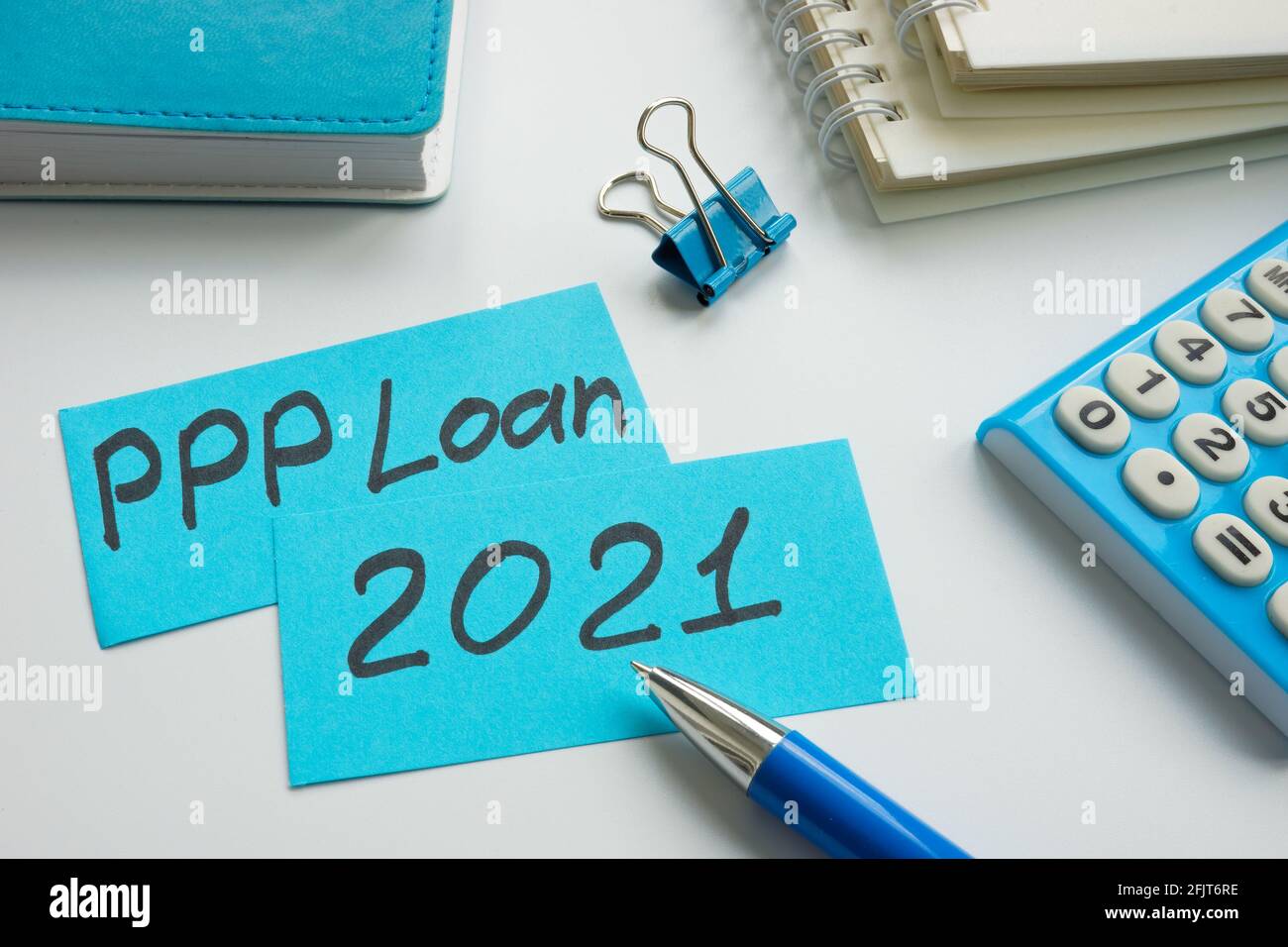 PPP loan 2021 words on the memo sticks. Stock Photo