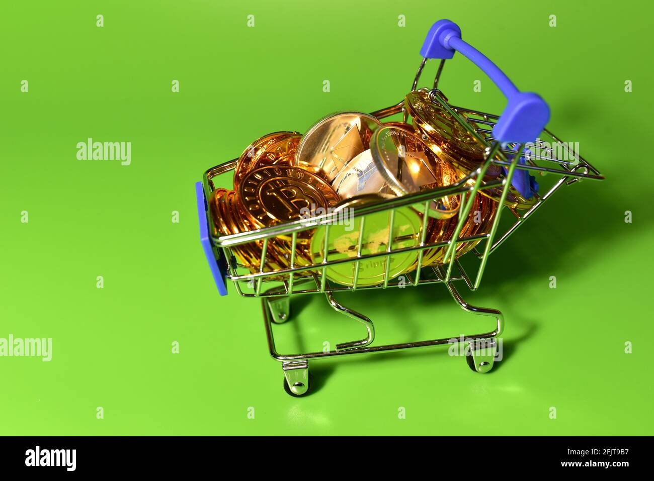 Shopping cart with bitcoin gold crypto coins. BTC cryptocurrency investing  concept in mini shopping trolley. Blockchain and financial technology. Make  Stock Photo - Alamy