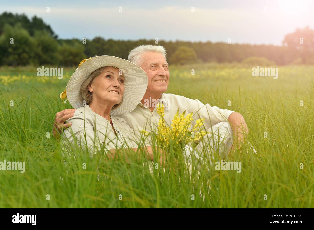 Portrait of beautiful senior couple in park Stock Photo - Alamy