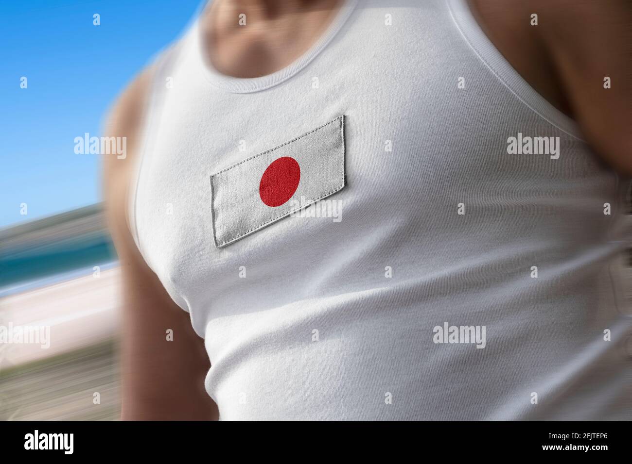 The national flag of Japan on the athlete's chest Stock Photo