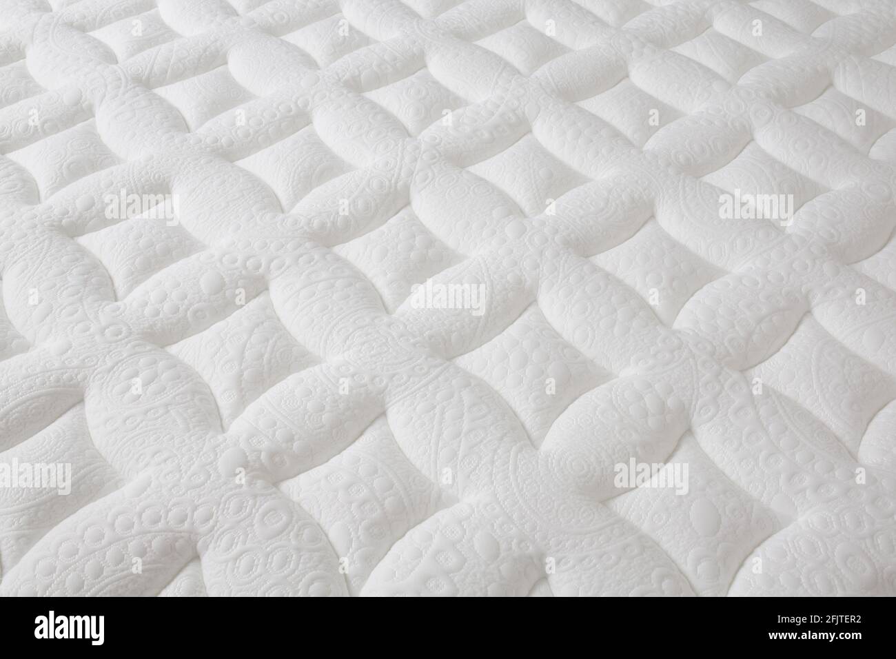 closeup of brand new clean texture white surface mattress, beautiful background Stock Photo