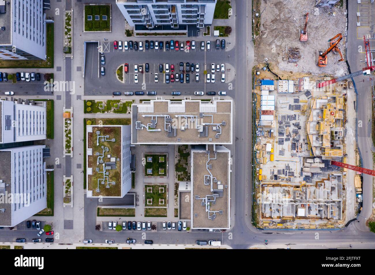 Aerial top view of construction site. Building new apartment blocks in ...