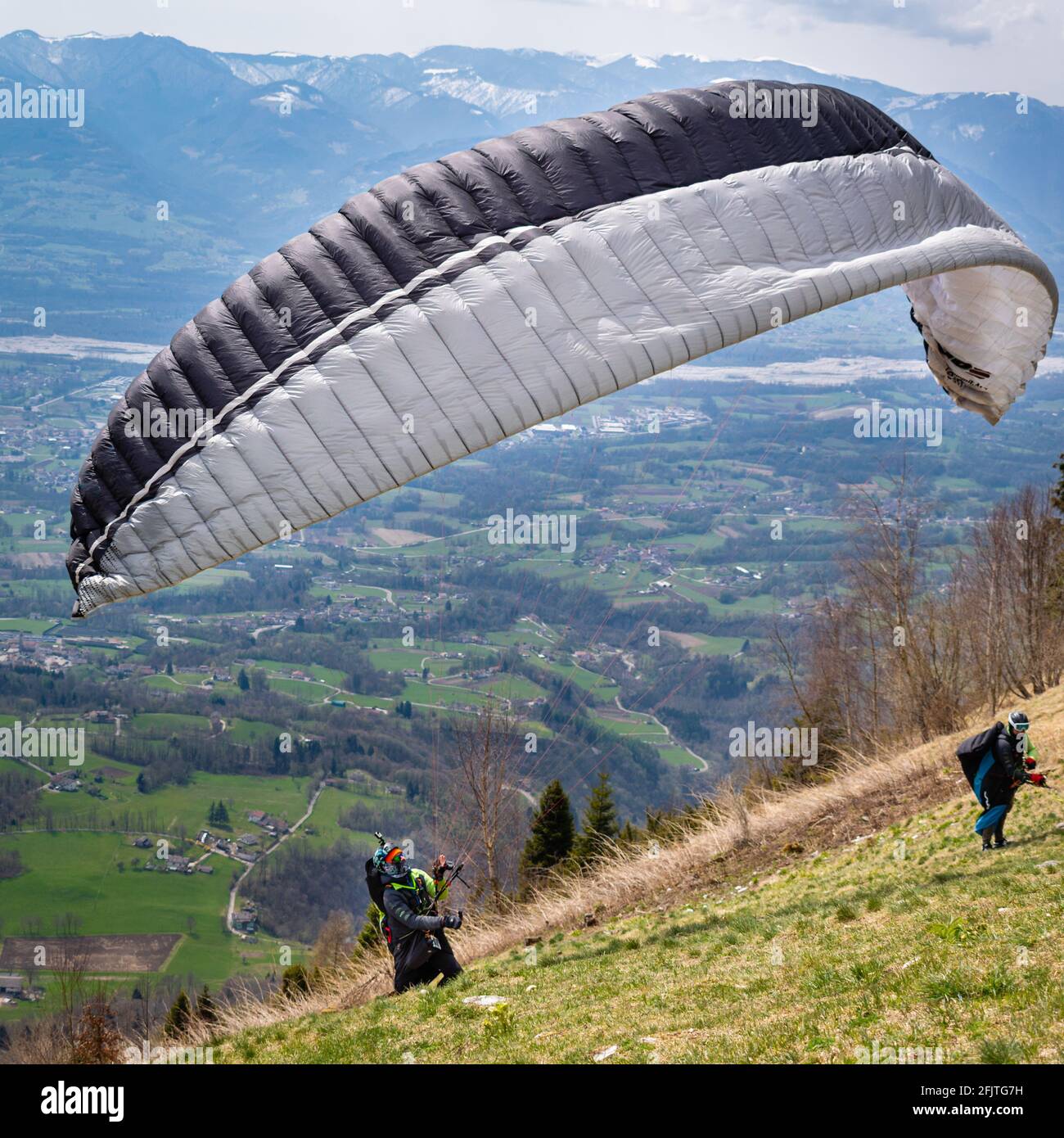 Panorama of the valley from the Ere Refuge. First attempt to start a paraglider. San Gregorio nelle Alpi, Belluno, Italy Stock Photo
