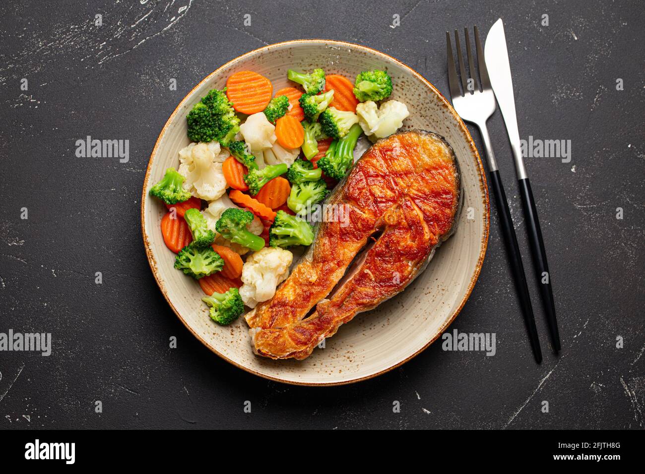 Grilled salmon steak with vegetables salad from above Stock Photo - Alamy
