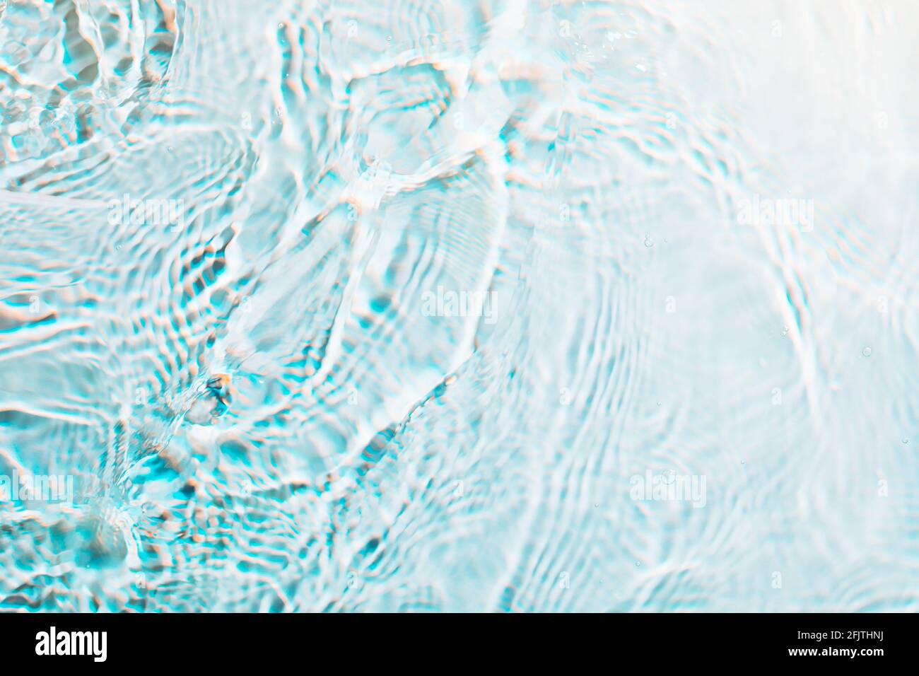 Light blue wavy abstract rippled water texture background Stock Photo