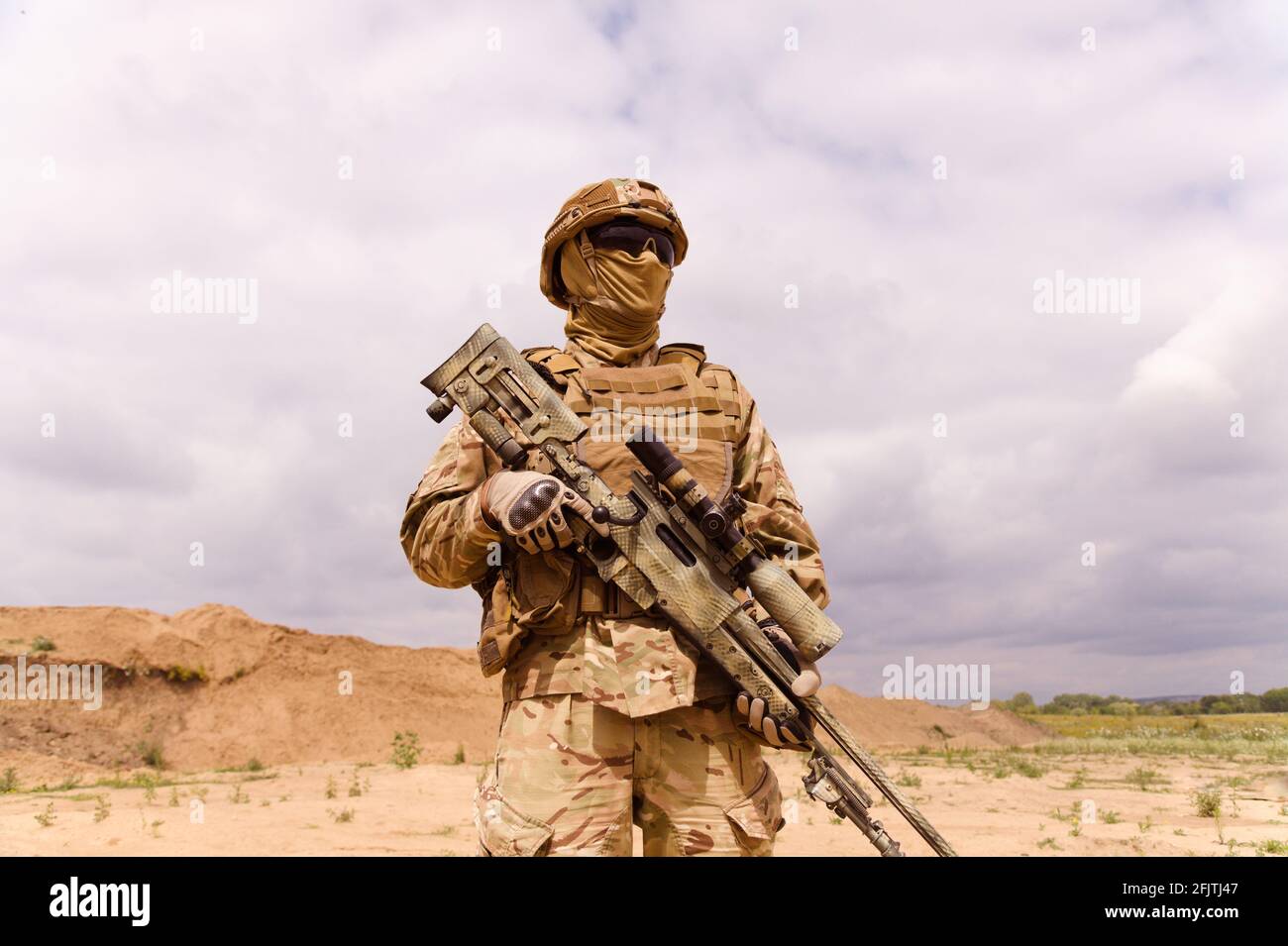 Equipped and armed special forces soldier with sniper rifle. Concept of military anti-terrorism operations, special operations of NATO forces. Stock Photo