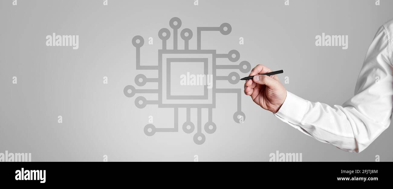 Businessman draws a computer processor chip on gray background. Future technology AI concept Stock Photo
