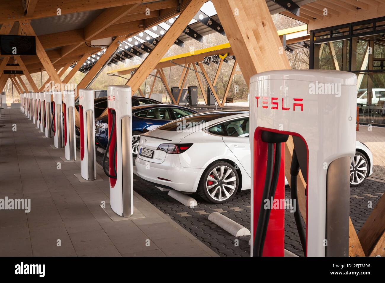 Supercharger charging station for Tesla electric vehicles, Tesla Model S,  Hilden, North Rhine-Westphalia, Germany. Supercharger Ladestation fuer Tesl  Stock Photo - Alamy