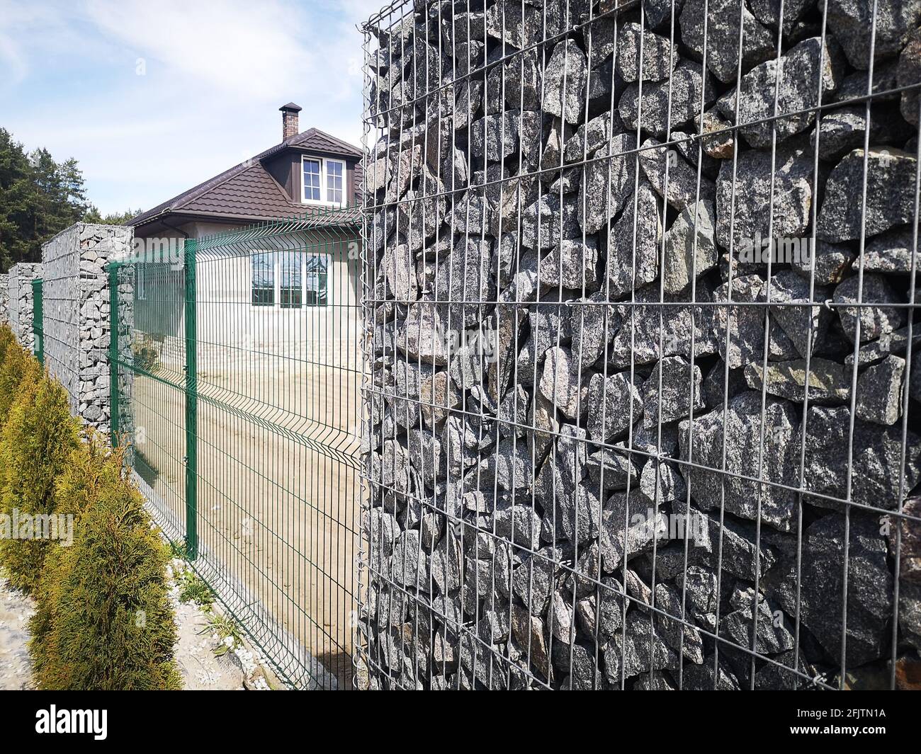 rectangular stone fence. stone building. Stock Photo