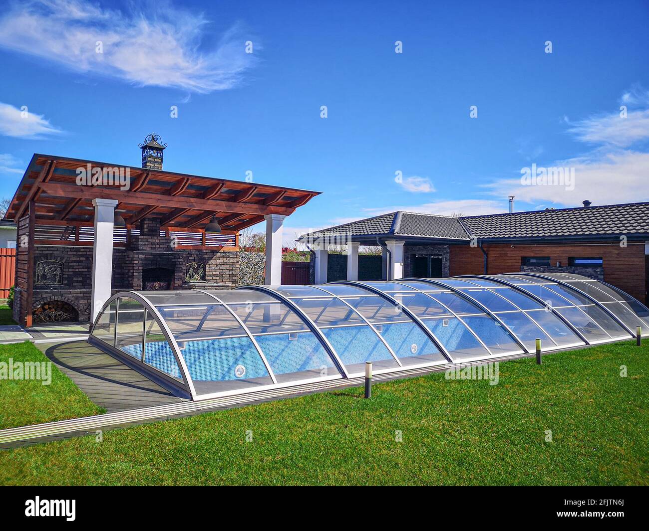 glass covered pool with water indoor swimming pool Stock Photo Alamy