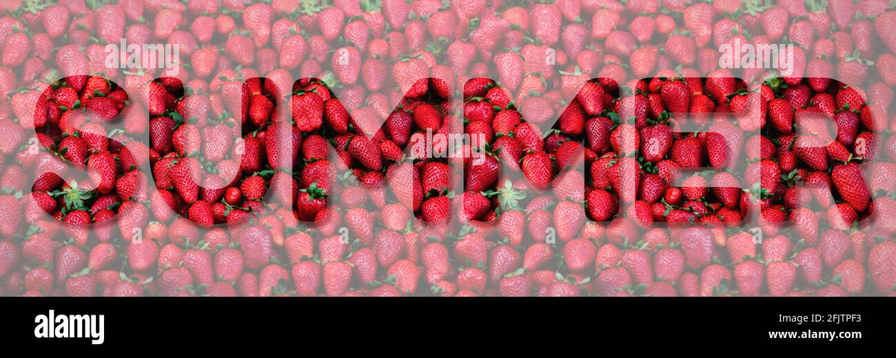 Inscription Summer made with fresh strawberries background. Copy space. Harvest. Food frame and banner. Text for your design. Stock Photo