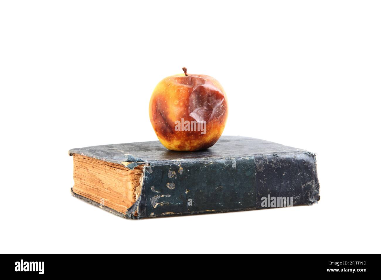 Concept for old outdated education system with rotten apple on top of