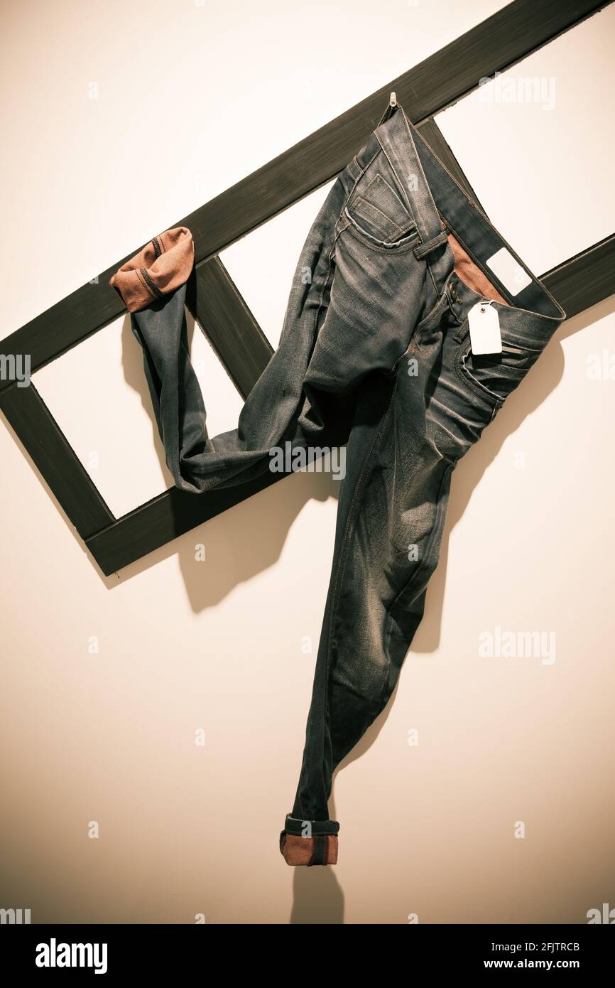 Jeans pants on window display Stock Photo Alamy