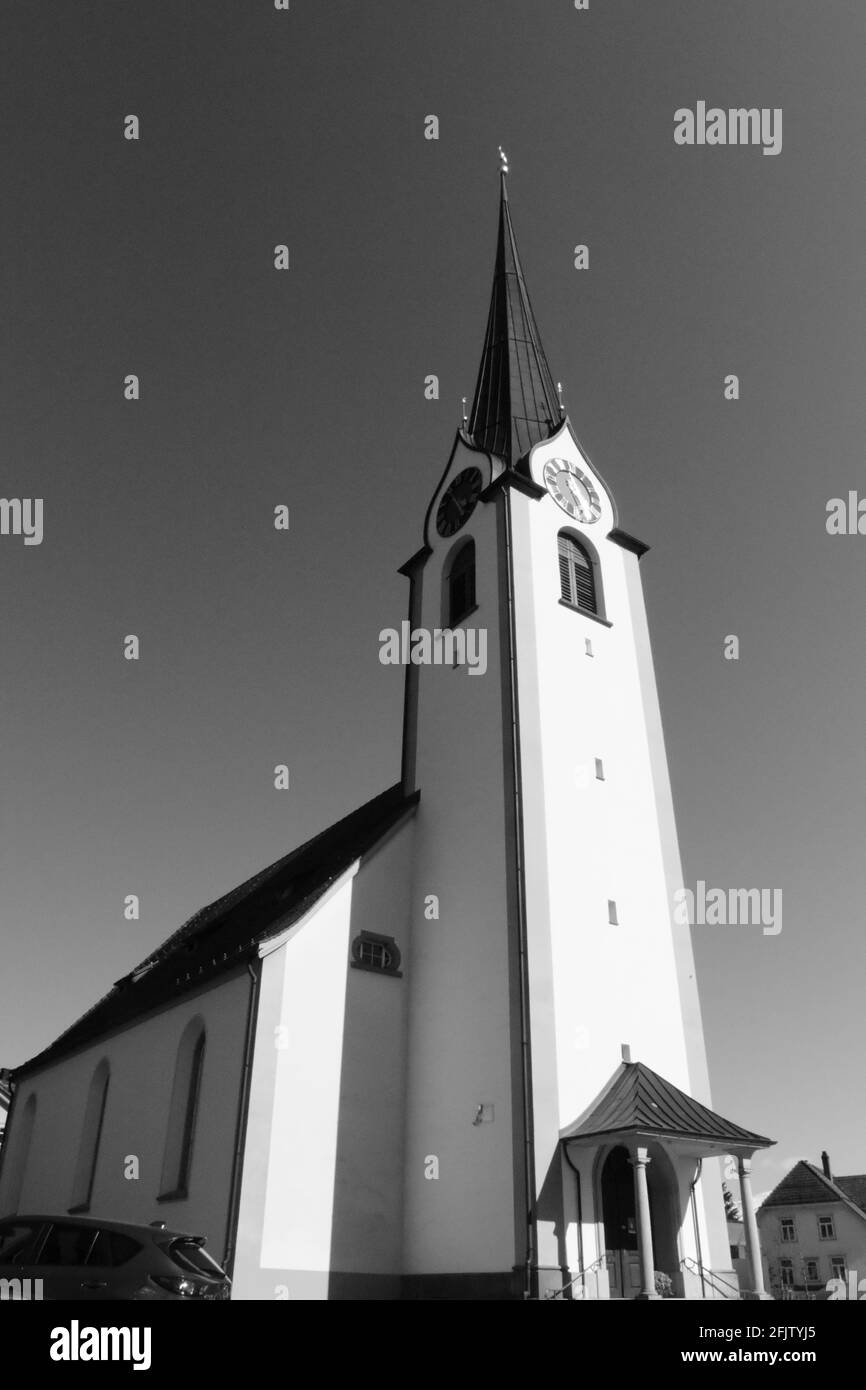 Vertical grayscale shot of a catholic church Stock Photo - Alamy