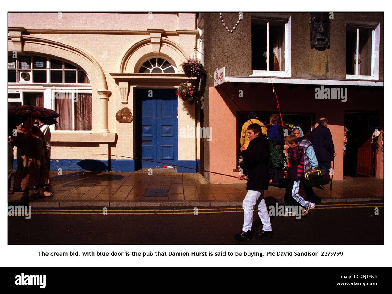 The cream bld. with blue door is the pub that Damien Hirst is said to be buying. It is in the harbour area in Ilfracombe. Pic David Sandison Stock Photo