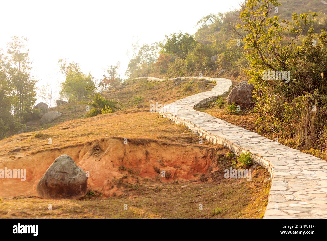 Curved path on the mountain. Stock Photo