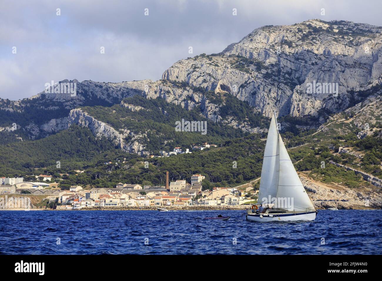 France, Bouches du Rhone, Marseille, 8th arrondissement, Montredon district, port of La Madrague, sailboat, Marseilleveyre massif in the background Stock Photo