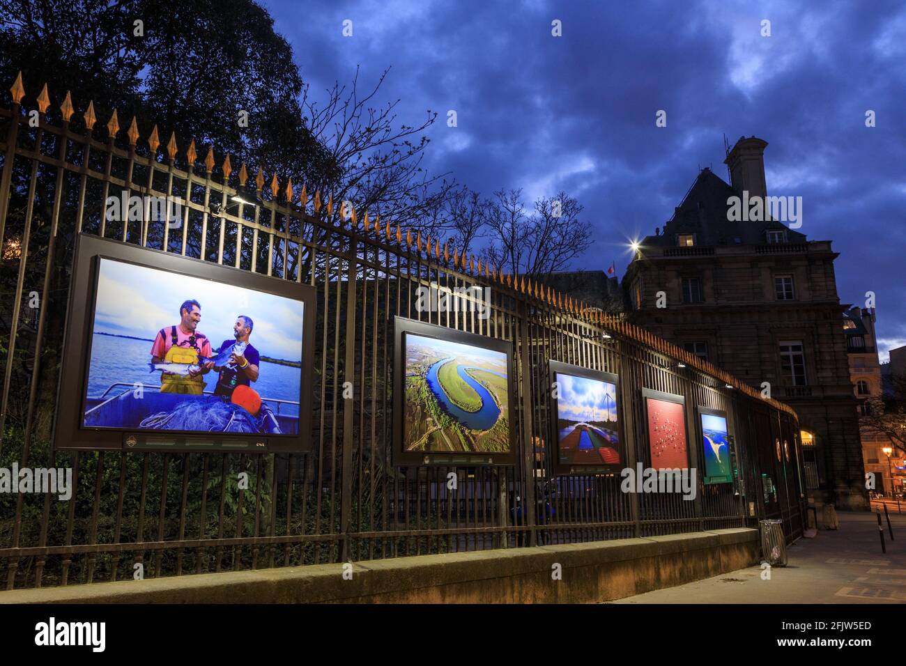 France, Paris, Jardin du Luxembourg, the gates of the Senat, exhibition Faces of the Rhone from March 13 to July 14, 2021 Stock Photo
