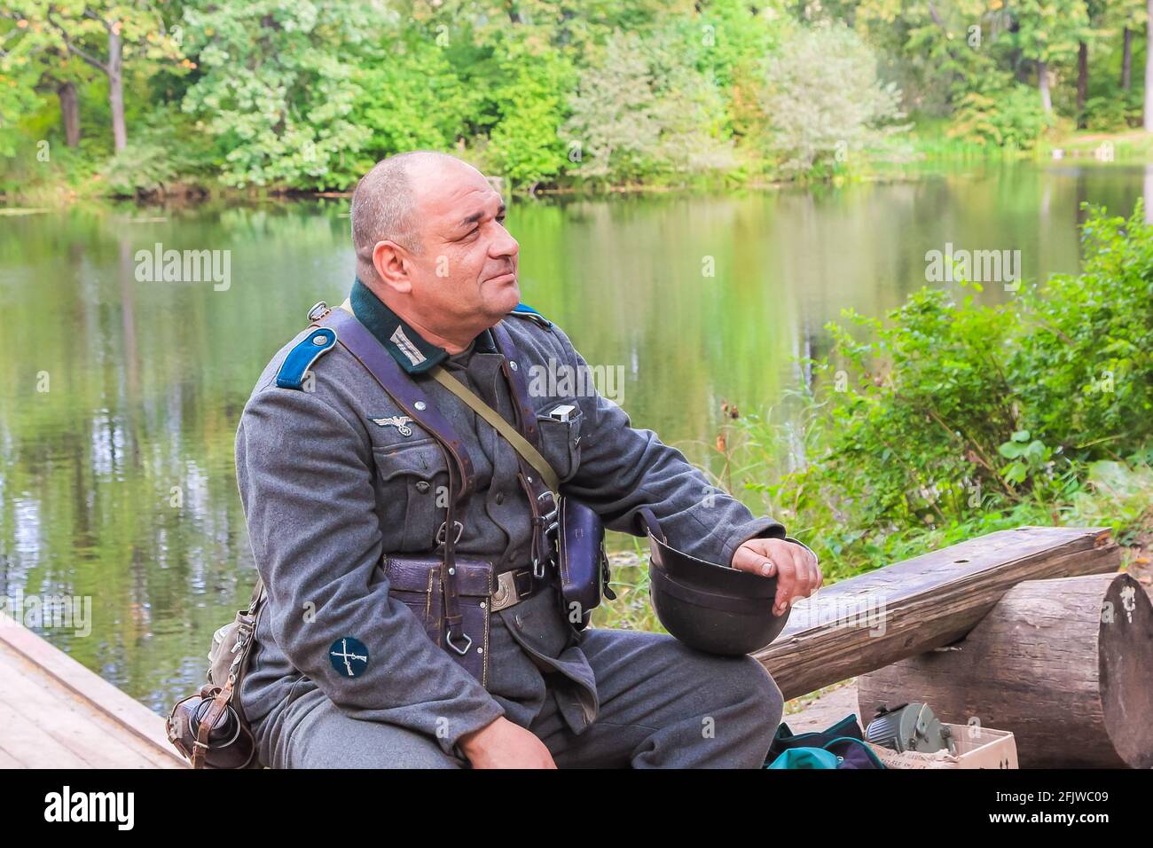 Reconstruction of the times of the Great Patriotic War. A German soldier is resting before the battle. Moscow Russia September 16, 2017 Stock Photo