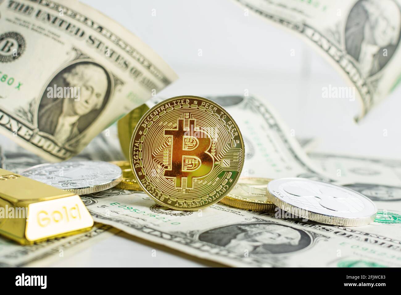 Various cryptocurrency coins with dollar banknotes and bitcoin in the  centre. Cryptocurrency, virtual money. Stock market concept Stock Photo -  Alamy