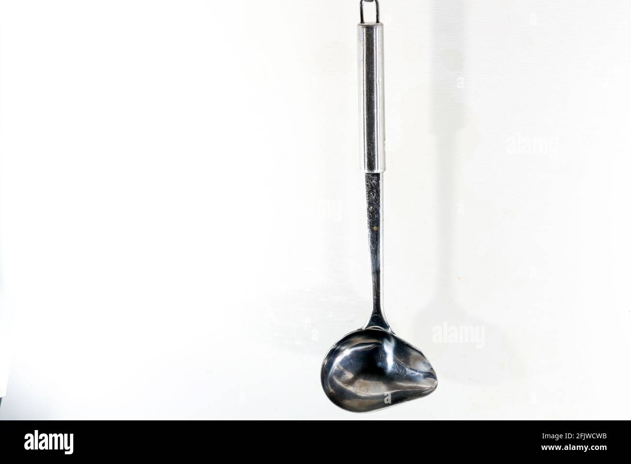 Abstract metallic kitchen spoon isolated on white background Stock ...