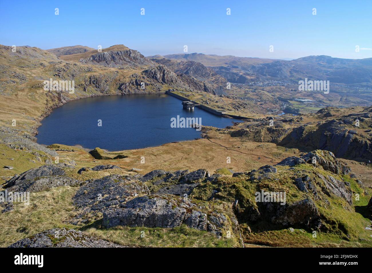 Views of Llyn Stwlan reservoir and dam from summit of Moelwyn Bach, Croesor, Wales Stock Photo